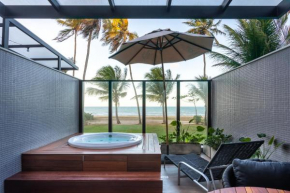 Loft com hidromassagem frente mar e pé na areia